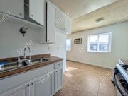 Photo - Upstairs 2 Bedroom 1 Bath with Massive Walk In Closet, Covered Gated Parking