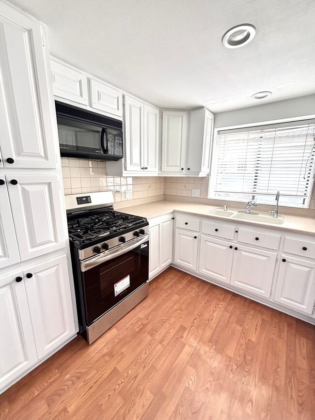 Photo - Spacious Private back house, W/D hookups, Garage, Walk-in closet