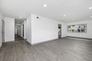3BD, 2BA - 1,600SF - Living Room - 1408 Barry Ave Apartments