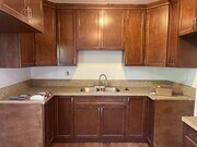 Newly renovated kitchen - 2458 S Normandie Ave Apartments