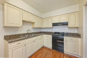 1BR, 1BA - 820SF - Kitchen - Village Green Apartments
