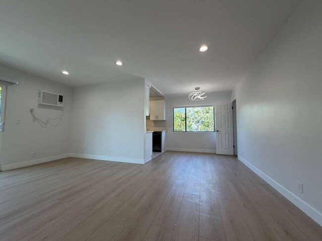 Building Photo - 7607 Norton Ave Unit Front
