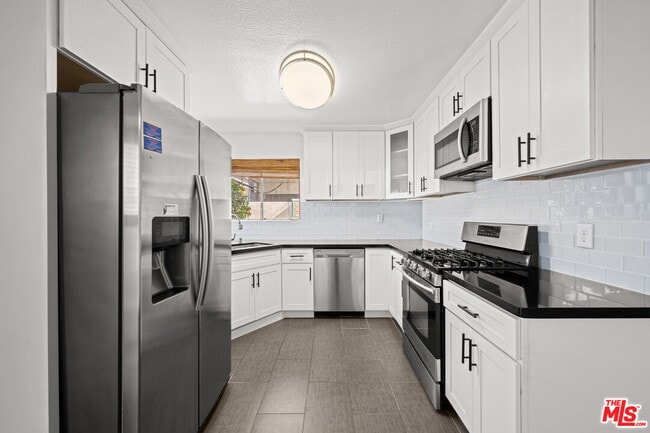 Building Photo - 610 Venice Way Unit 101