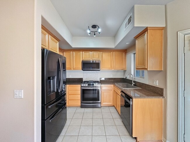 Photo - Spacious 2B/2.5BA Townhouse in North Park w/ Two-Car Garage & A/C!
