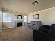 Living Room w/ Fireplace - 11050 Keswick St House