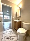 New tiled bath - 4747 Oregon St Apartments Unit B