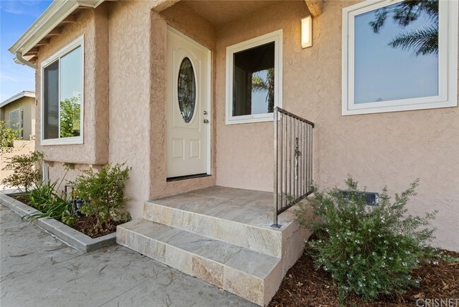 Photo - 7742 Bakman Ave