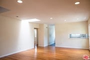 Part of dining room an opening to kitchen - 3864 Girard Ave House