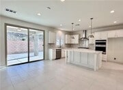 Photo - Stunning and Spacious 6BR 5BA Home w/ Solar Panels + Quartz Counter + Fenced Yard + 2 Car Garage ...