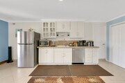 Full kitchen with stove, oven, dishwasher, refrigerator, and microwave. Also includes coffee machine - 32702 Seven Seas Dr House