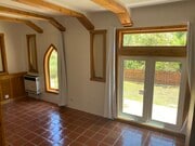 Vaulted ceilings and double front doors. - 6206 Temple Hill Dr Unit Lower