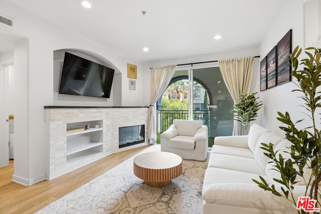 Building Photo - 12963 W Runway Rd Unit 321