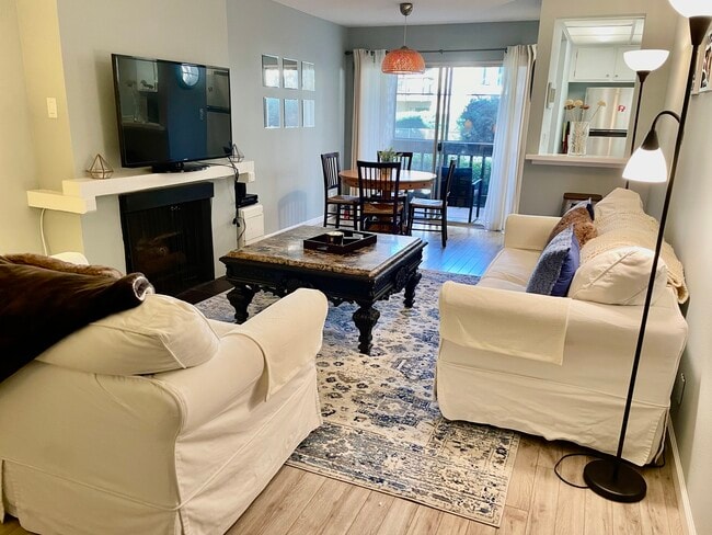 Calm, peaceful living room with views of the pool. - 4111 Summertime Ln Condo Unit 4111