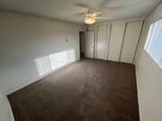 Master bedroom - 2650 E 19th St Apartments Unit 3