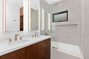 Bathroom #1 with dual sinks and spa shower/bath. - 4638 Del Monte Ave