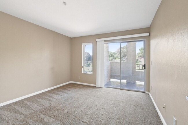 Photo - 1BR Condo with Private Balcony, Central A/C & Community Amenities in Corona