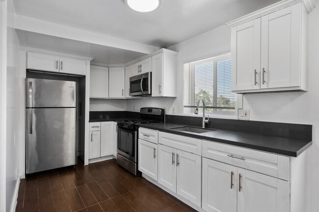 Building Photo - 501 S Lorena St Unit 3