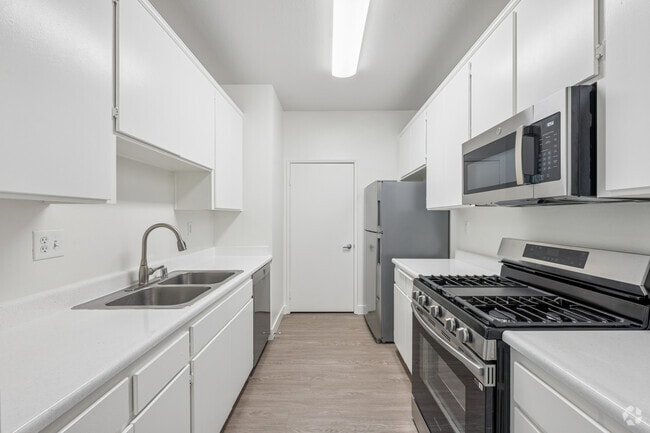 2BR, 2BA - 1090SF - Kitchen - Northpoint Apartments at CSUN