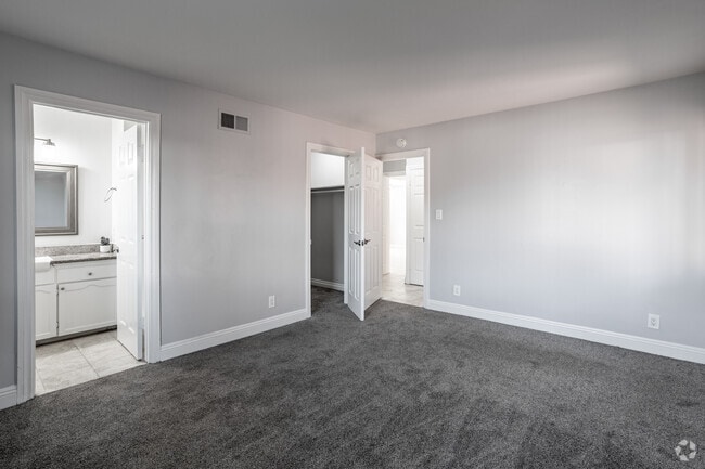 2BR, 2BA - 950SF - Primary Bedroom - Chaumont Villas Apartments