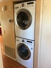 washer/dryer in hall - 5706 Fair Ave Condo Unit 116