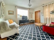 living room looking towards the east out of the wndow - 1619 1/2 Grafton St Apartment