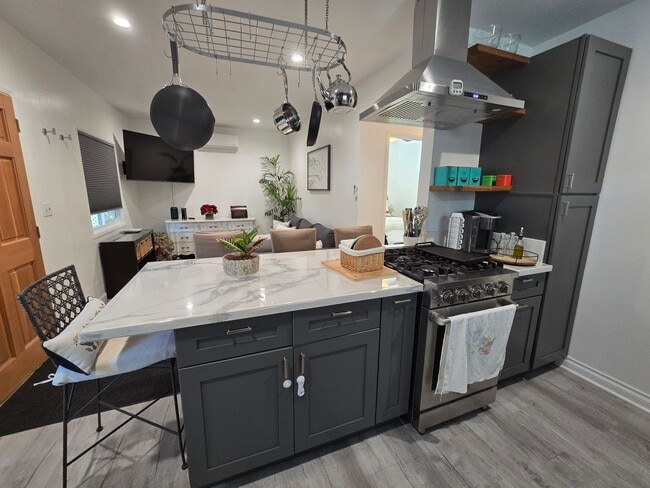 Photo - Fully furnished, modern ADU with fully-equipped kitchen shared garden.