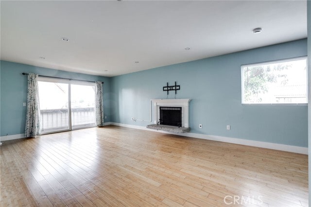 Building Photo - 6600 Warner Ave Unit 130