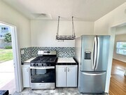 Photo - 3bd/1ba OB Home with OCEAN VIEWS! Hardwood floors, fenced yard, garage, laundry!