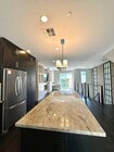 2nd level Kitchen - 7870 Civita Blvd Townhome