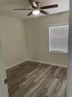 Flooring is now brand new natural color wood - 4257 N Bellflower Blvd Unit 4257 N Bellflower