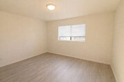 Photo - Recently Renovated, Single-Level 2-Bedroom Apartment with Small Fenced Yard. Unit O