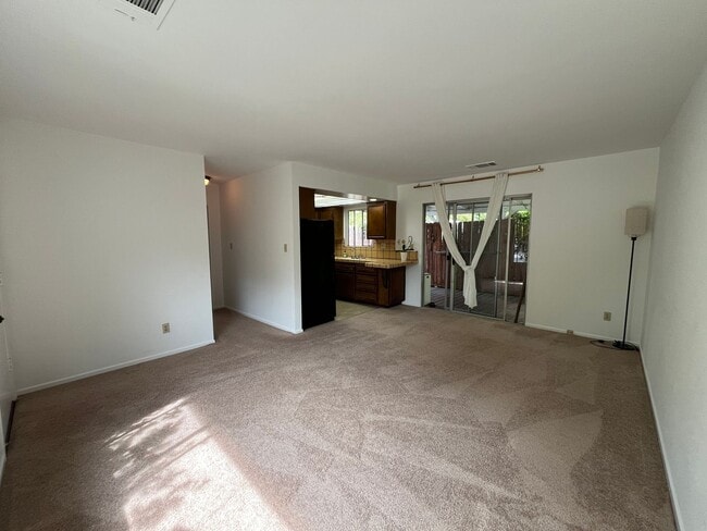 Photo - Pet friendly 2+1 w/private yard + in-unit laundry!