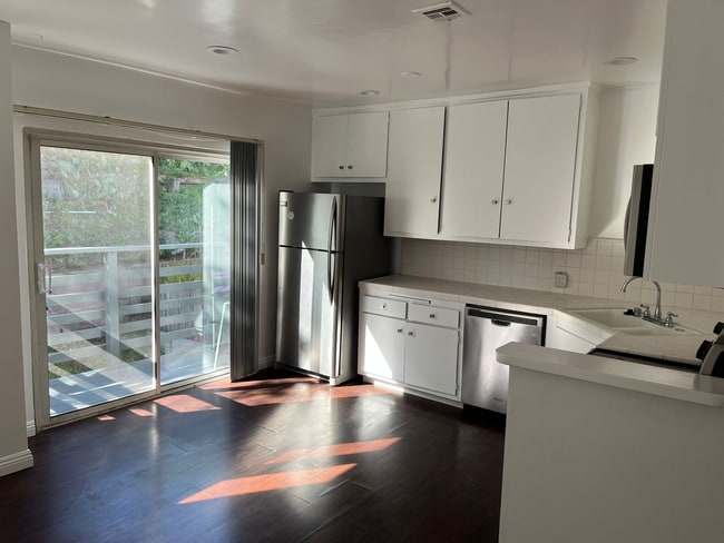 Kitchen with Balcony - 8315 W Manchester Ave Apartments Unit 4