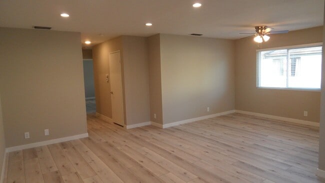 Photo - REMODELED 2BR; 2BA end unit condo with 1 car garage & 1 parking space