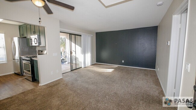 Photo - Bright Upgraded Condo w/ Quartz Kitchen, Covered Parking, Pool & Spa Unit 202
