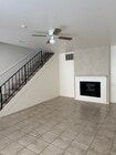 Living Room with Fireplace - 4048 Maxson Rd Townhome