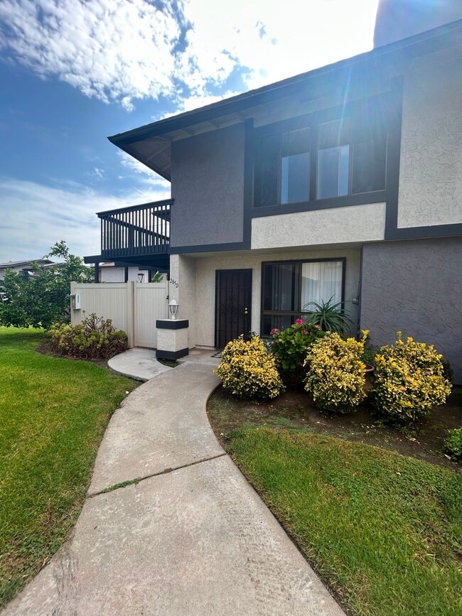 Photo - Beautifully Updated 3-Bedroom Townhome with Fireplace, Private Patio & Community Pool $3,495