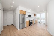 3BR, 3BA - 1,175SF - Kitchen - 3844 W 27th St Apartments