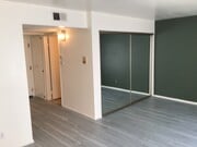 Master bedroom with 1 of 2 mirrored sliding door closets - 3601 Hughes Ave