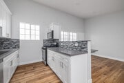 2BR, 1BA - 850SF - Kitchen - 10202-10206 S 10th Ave, LLC