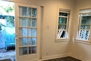 Bedroom with doors to private yard - 7415 Rosewood Ave